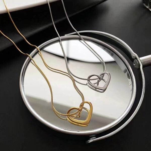 New-Style Hollow-Out Heart Necklace - Versatile Pendant with Minimalist Luxury Collarbone Chain