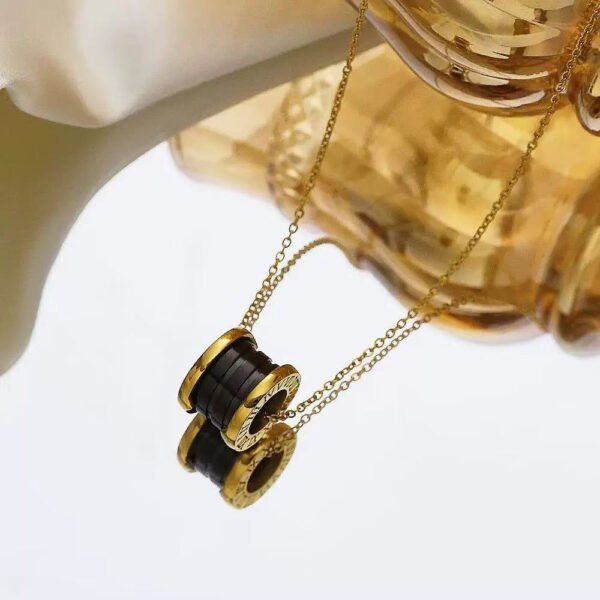 Women's Titanium Steel Necklace - Slim Waist Design with Black Ceramic, Long Statement Necklace for Sweaters, High-End Collarbone Chain with Pendant